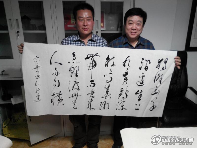 国画家胡广宇与军旅书法家许新建大校合影