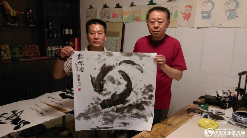 国画家胡广宇与齐海军老师合影