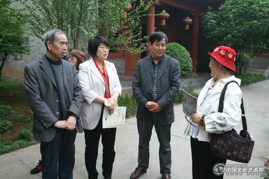 杨月明与洛阳市政协副主席雷雪芹、孟留山院长、黄建忠董事长交流1.jpg