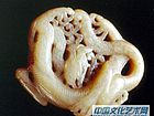 唐白玉龙纹佩