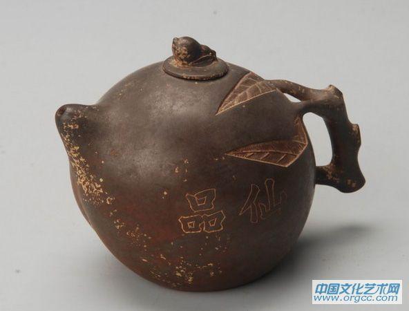 钦州紫砂挂釉桃式茶壶